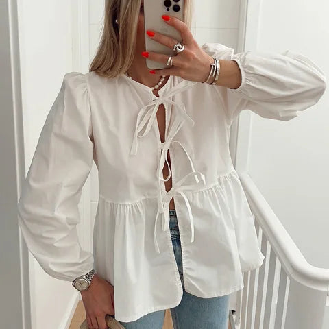 Blouse femme à manches bouffantes et nœud