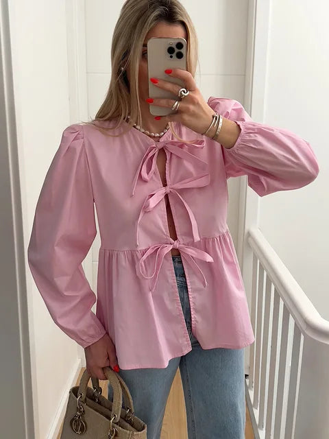 Blouse femme à manches bouffantes et nœud
