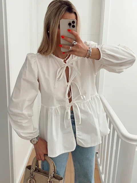 Blouse femme à manches bouffantes et nœud
