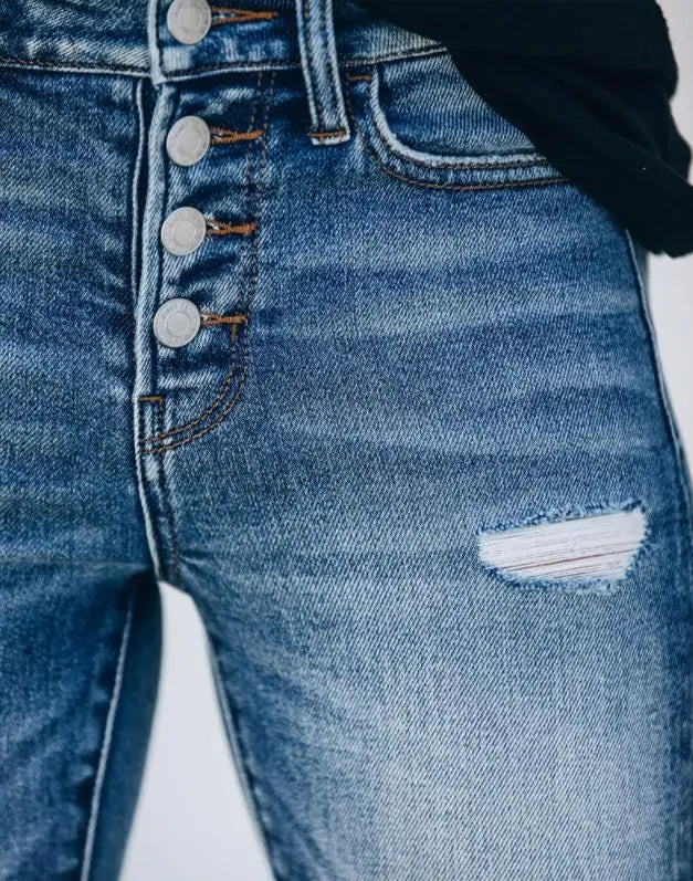 Jean slim moderne pour femme en denim déchiré