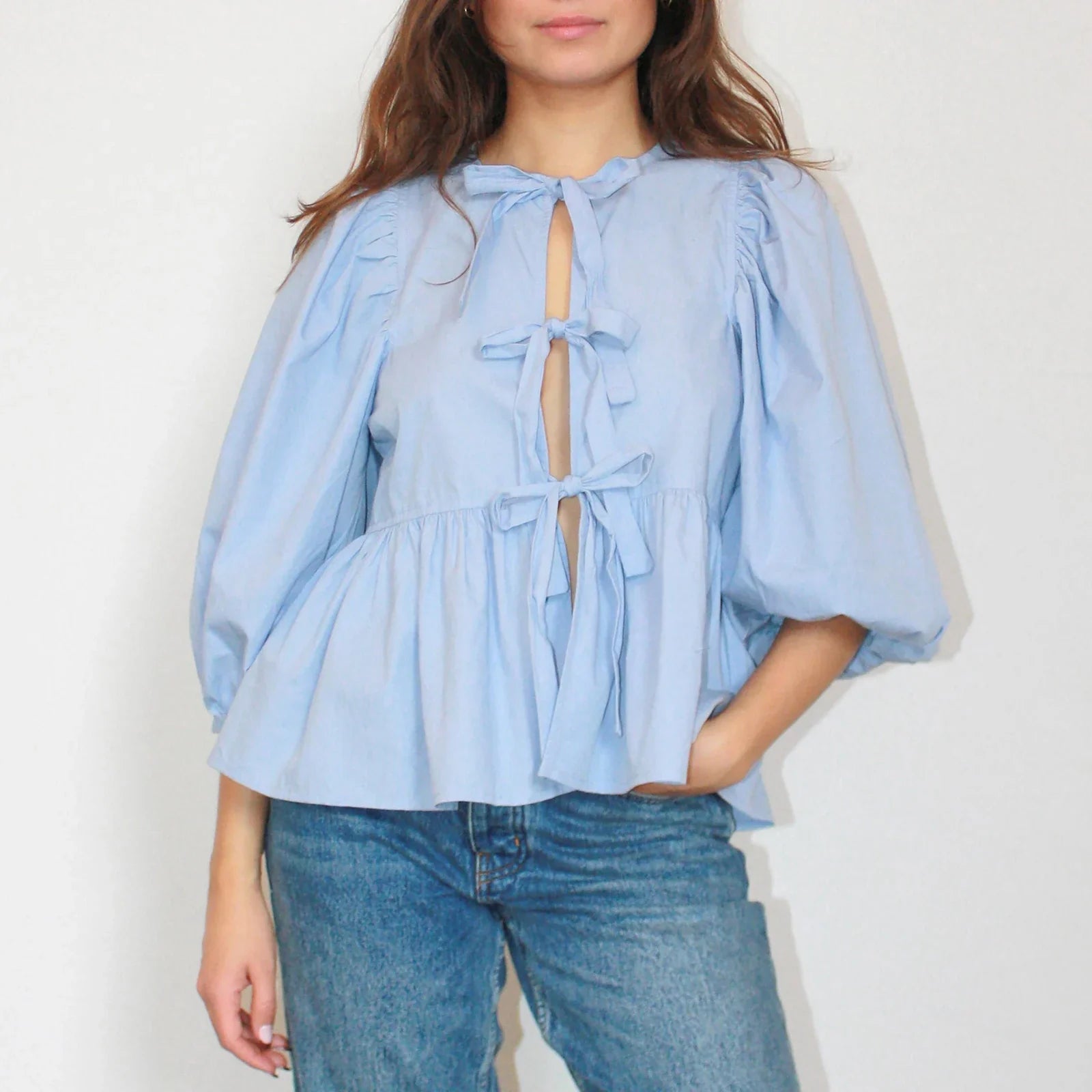 Blouse femme à manches bouffantes et nœud